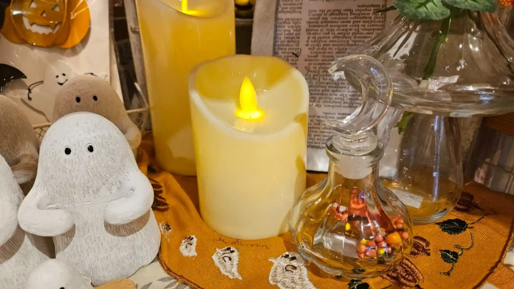 Cozy Japanese Halloween decor with candles and ceramic ghosts